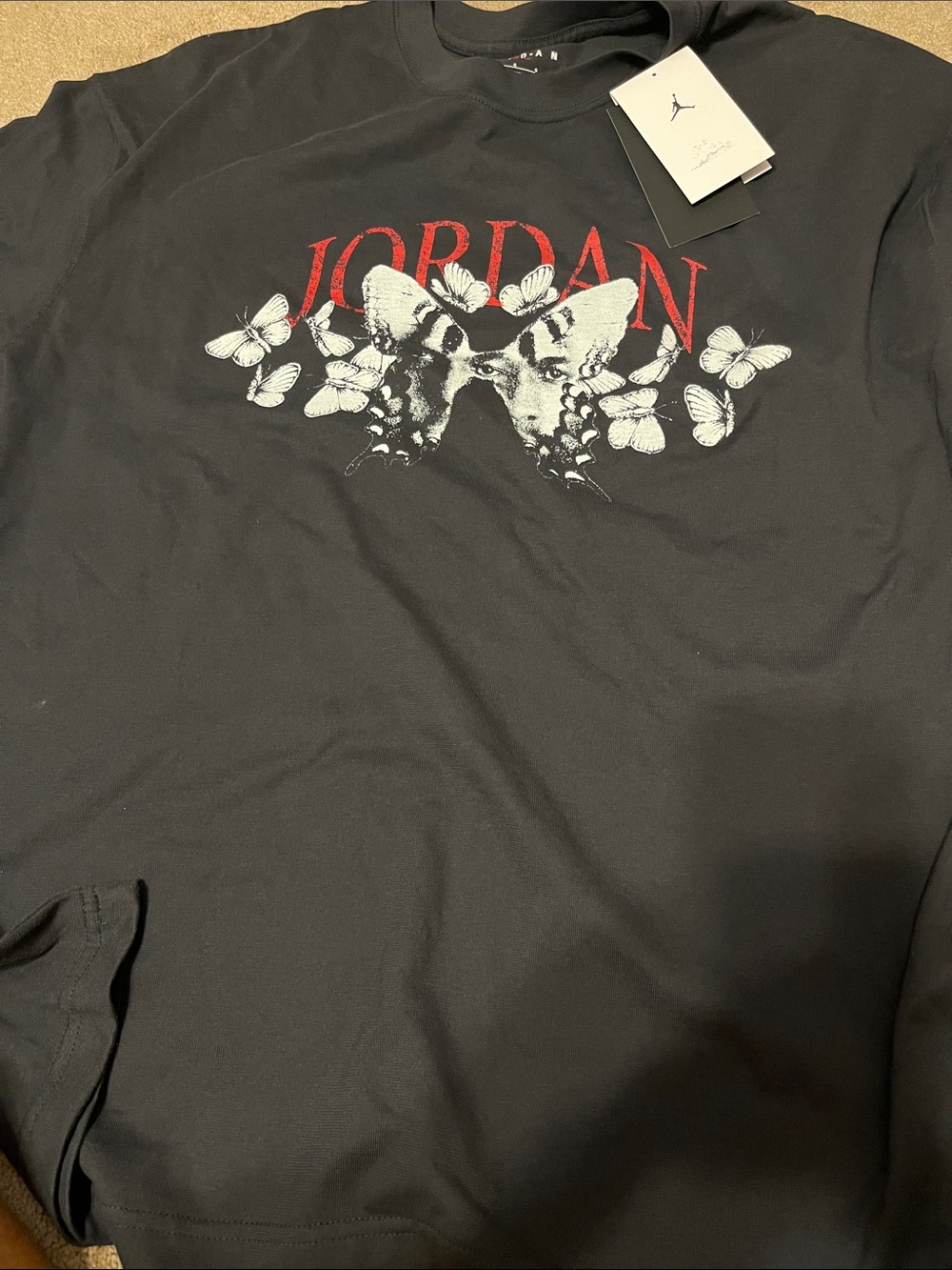 Jordan Black Tee with Red Logo and White Butterfly Graphic